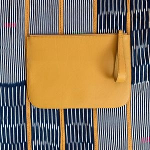 Lipault paris leather clutch in mustard yellow